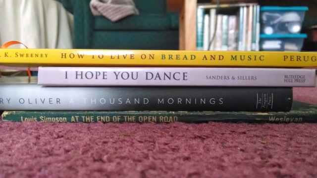 "How to live on bread and music/I hope you dance/A Thousand Mornings/At the end of the open road" Bookspine poem by Meg Winikates